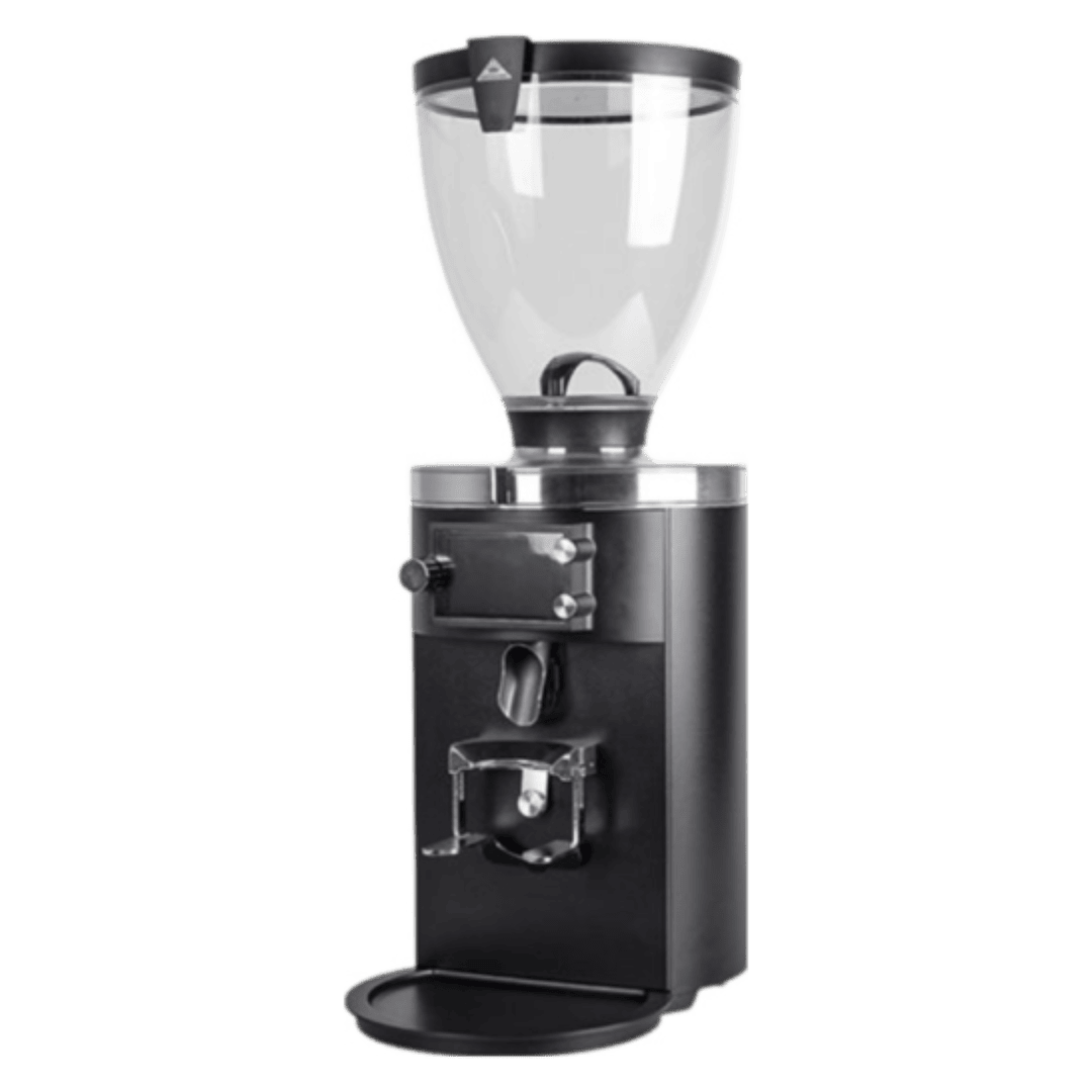 Treehouse coffee. A commercial coffee grinder with a transparent bean hopper on top, featuring a black and metal design. The grinder has a dosing mechanism on the front, a dispensing spout, and a small tray at the bottom for catching grounds.