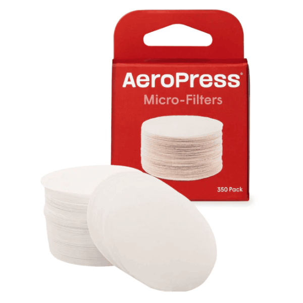 Badger & Dodo. A red box labeled AeroPress Filters with circular white filters stacked in front.