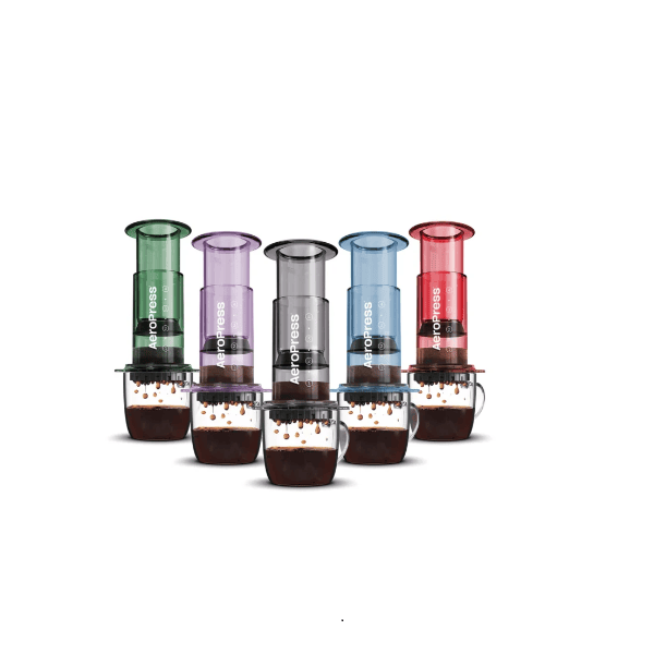Badger & Dodo. Five Aeropress Coffee Maker-Clear Colours brew rich coffee into clear mugs, each pouring out vibrant coffee drops in a range of clear hues.