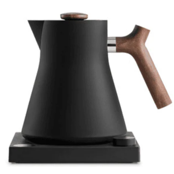 Modern black electric kettle with a matte finish, featuring a wooden handle and lid knob, placed on a square base with a control dial.