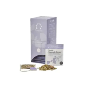 Badger and Dodo Coffee Roasters: A box labeled Organic Chamomile Dream tea is shown alongside an individual tea packet and an opened tea bag, with loose chamomile leaves spilling out. The Solaris-styled box features a subtle leaf design, enhancing its dreamy aesthetic.