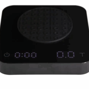 Badger and Dodo Coffee Roasters: The Acaia Pearl S - Black kitchen scale includes a digital display with 0:00 on the left and 0.0T on the right, perfect for coffee lovers. Its round, textured weighing surface and bottom-left power button ensure precision brewing is simple and effective.