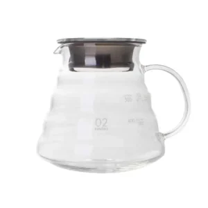 Badger and Dodo Coffee Roasters: The Hario V60 Range Server is made of clear glass with capacity markings, featuring a wide base, curved handle, and a stainless steel lid. Its modern minimalist design suits brewing and serving coffee or tea.