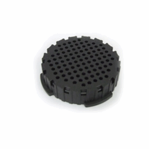 Black plastic AeroPress filter cap with a circular shape and multiple small holes on the top surface.