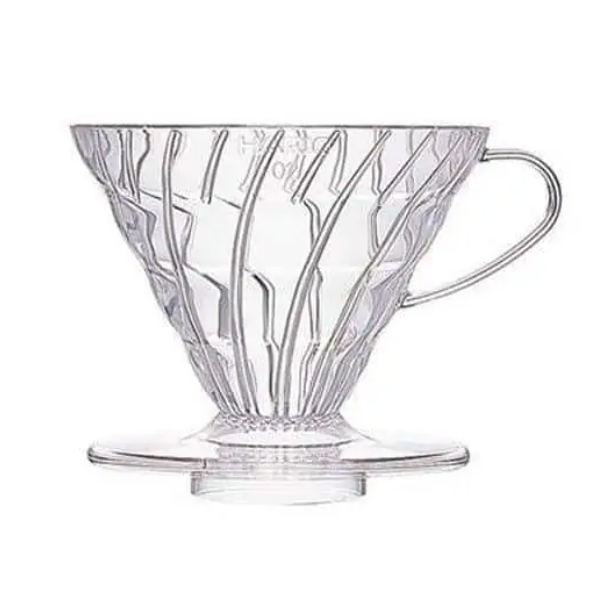 Badger and Dodo Coffee Roasters: The Hario V60 Dripper is a see-through, cone-shaped coffee brewer with vertical ridges and a handle, ideal for manual pour-over brewing. It features a flat base that fits perfectly on your favorite cup or carafe.